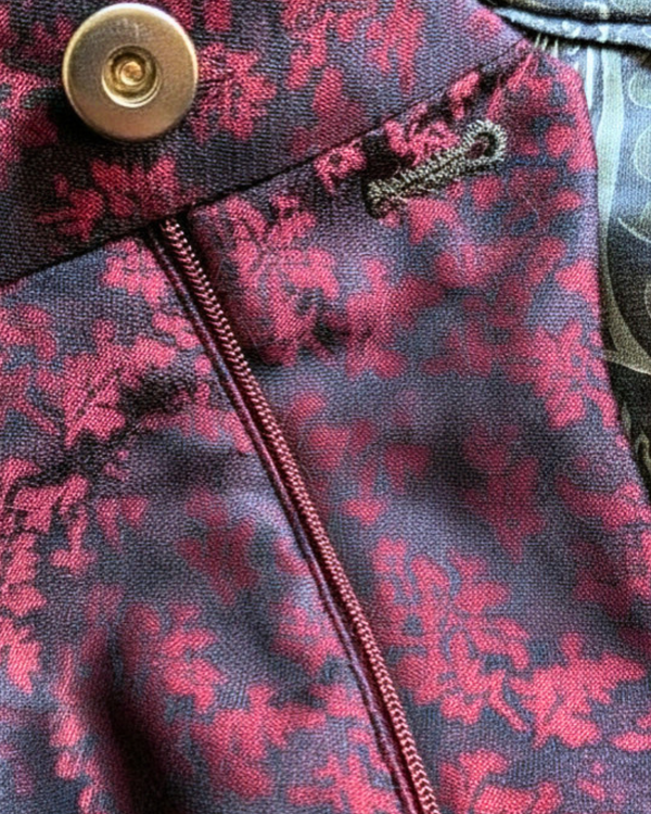 Obsidian - maroon leaf print tuxedo pants with black paisley contrast