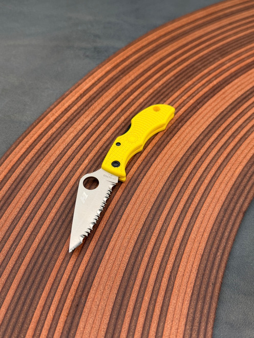 The Spyderco LadyBug 3 Salt with serrated blade in H2 steel and yellow FRN handle scales.