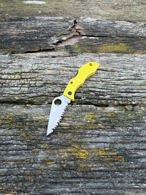 The Spyderco LadyBug 3 Salt with serrated blade in H1 steel and yellow FRN handle scales.