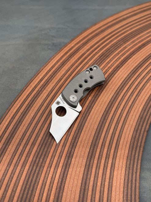 The Spyderco McBee with CTS-XHP blade steel and titanium framelock handle scales.