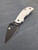 The Spyderco Urban GP Knives Exclusve with white FRN scales and PVD coated REX45 blade.