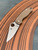 The Spyderco Para 3 with a blade in CPM 15V steel and brown G10 handle scales.