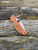 The Spyderco Sage 5 in REX 121 steel and  burnt orange coloured G10 handle scales.