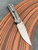 Chris Reeve Sebenza Large 31 'Plain Jane' glass bead blasted with drop point Magnacut blade.