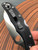 The Spyderco Matriarch 2 with reverse s shaped blade in VG-10 steel.