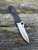The Spyderco Starmate pictured in both open and closed positions.
