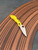 The Spyderco LadyBug 3 Salt with serrated blade in H1 steel and yellow FRN handle scales.