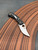 The Spyderco Reinhold Rhino with CTS-XHP blade and carbon fibre/G10 laminate handle scales.