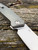 The Anso of Denmark TOKO with Cuprum anodised titanium scales.
