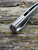 The Anso of Denmark TOKO with Cuprum anodised titanium scales.