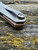 The Anso TOKO with satin finished titanium scales and solid bronze backspacer.