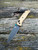 Pre-Owned Benchmade Bugout Burnt Brass