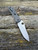 The Spyderco Bradley Folder 2 with CPM M4 tool steel blade and carbon fibre/G10 laminate handle scales.