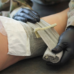 Trauma Dressings and Blood Clotting Agents