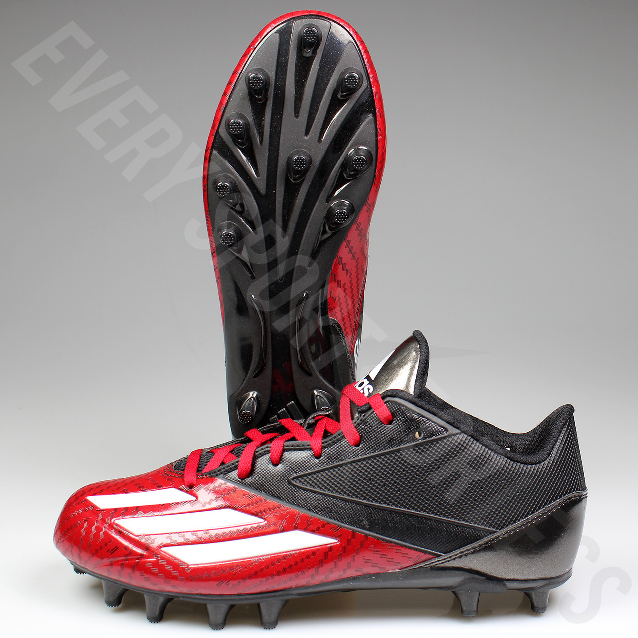 red and black adidas football cleats