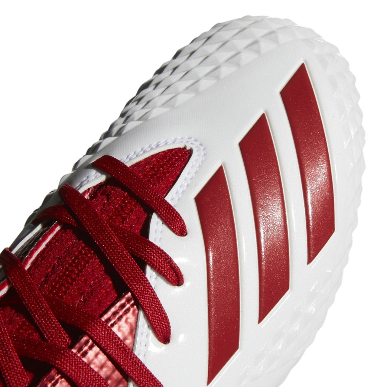 white and red football cleats