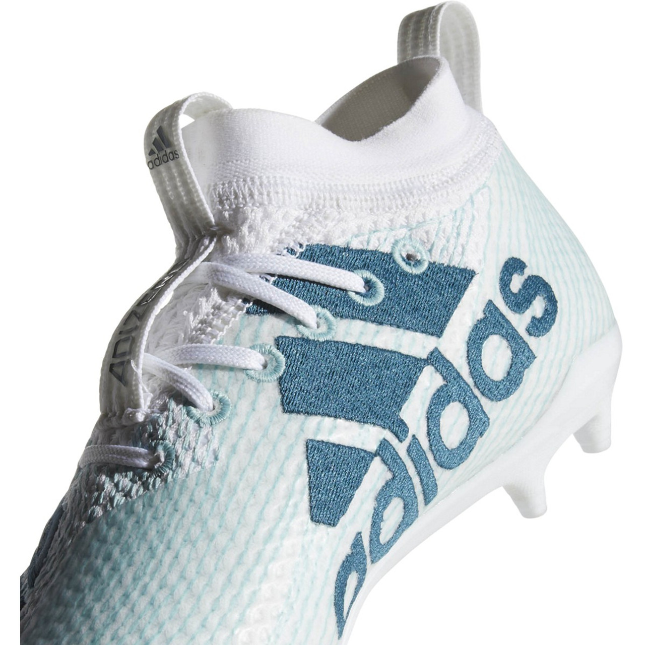 teal color football cleats