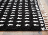 Minston - 5' x 7' Rug - Black / White