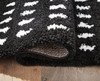 Minston - 5' x 7' Rug - Black / White