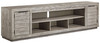 Naydell - XL TV Stand w/Fireplace Option - Gray