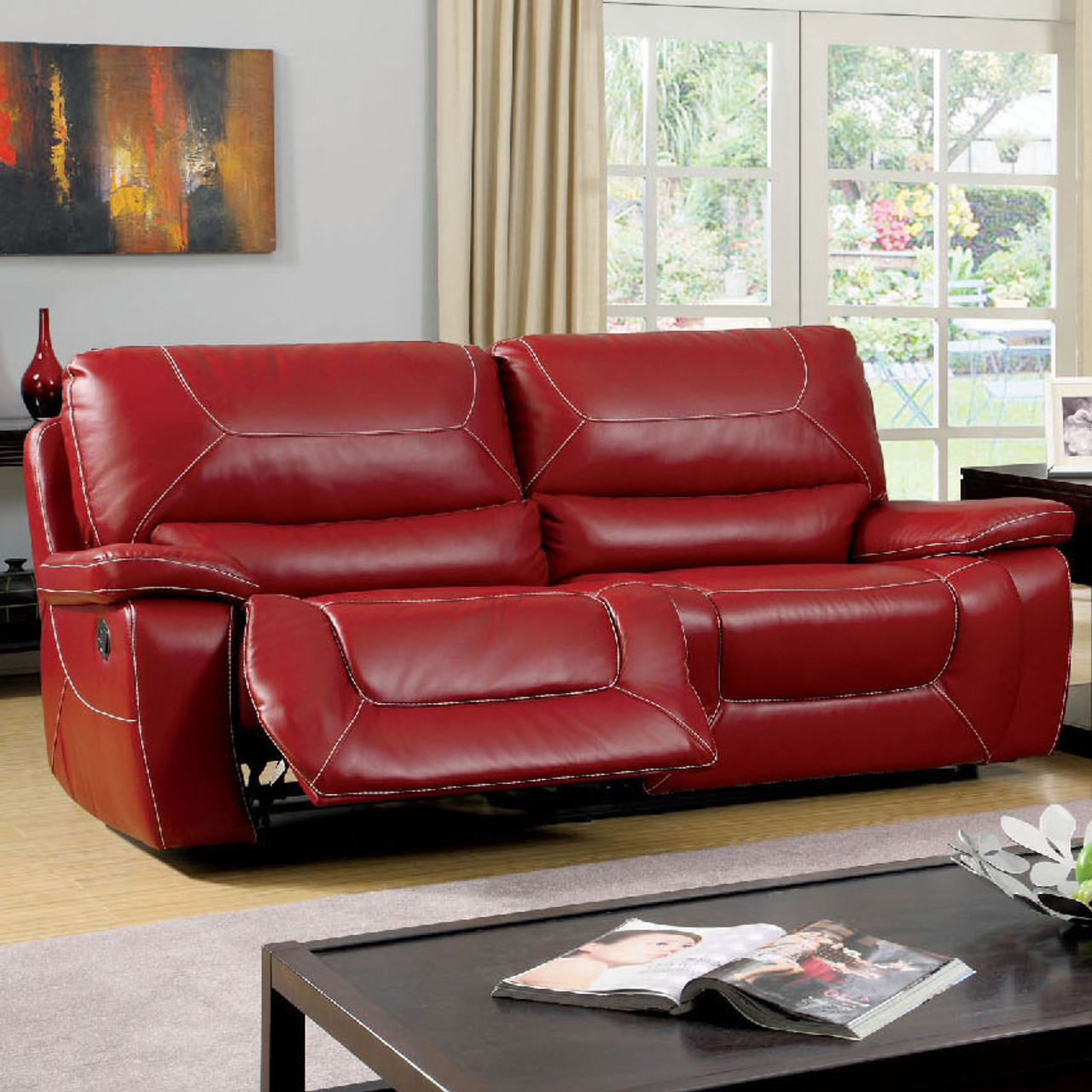 red leather reclining sofa