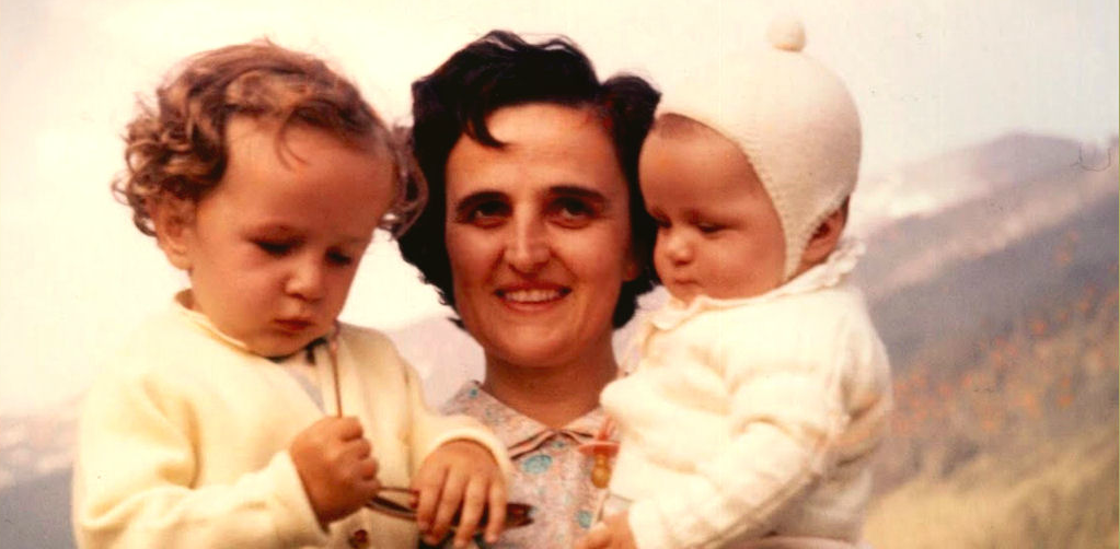 St. Gianna Molla holding 2 of her children