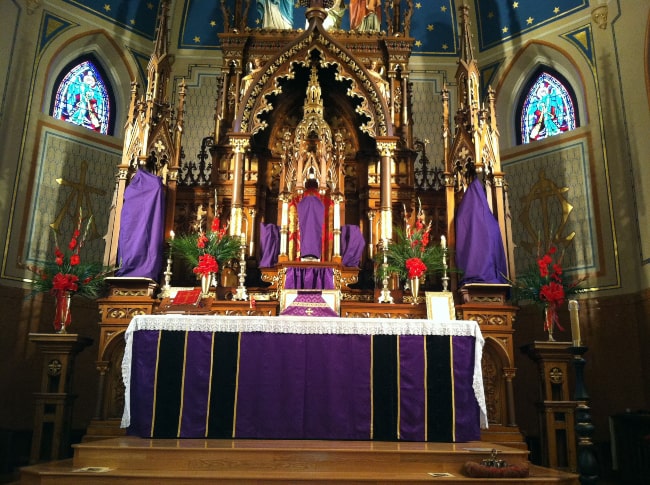 Veiled statues and crucifix 