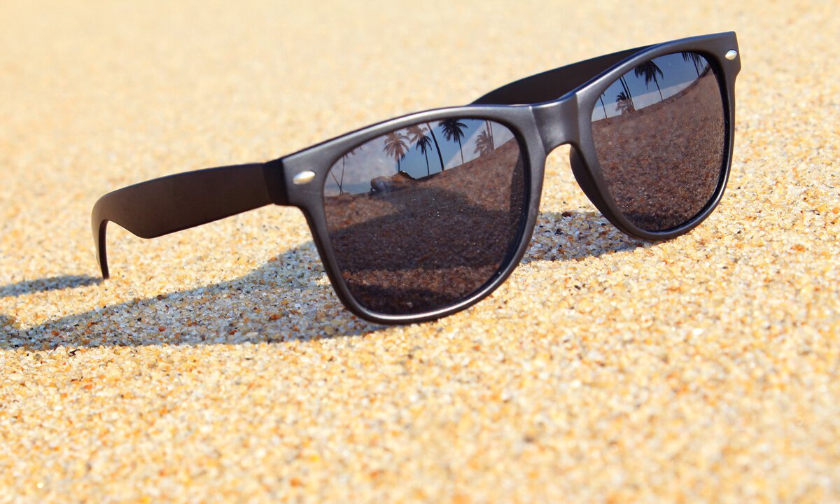 TheraSpecs Classic Style Sunglasses with FL-Sun Lenses on Beach