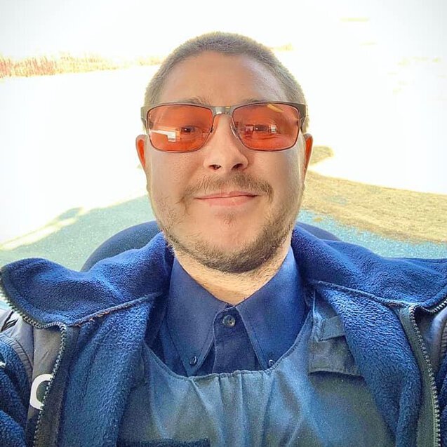 Dean wearing FL-Pro TheraSpecs for vestibular migraine and light sensitivity