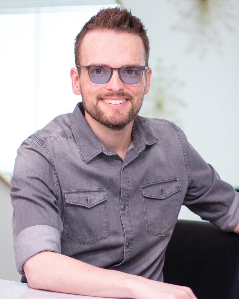 Man wearing TheraSpecs Z-Blue for flashing lights