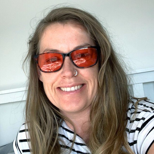 Sarah wearing FL-Pro TheraSpecs for autism-related light sensitivity
