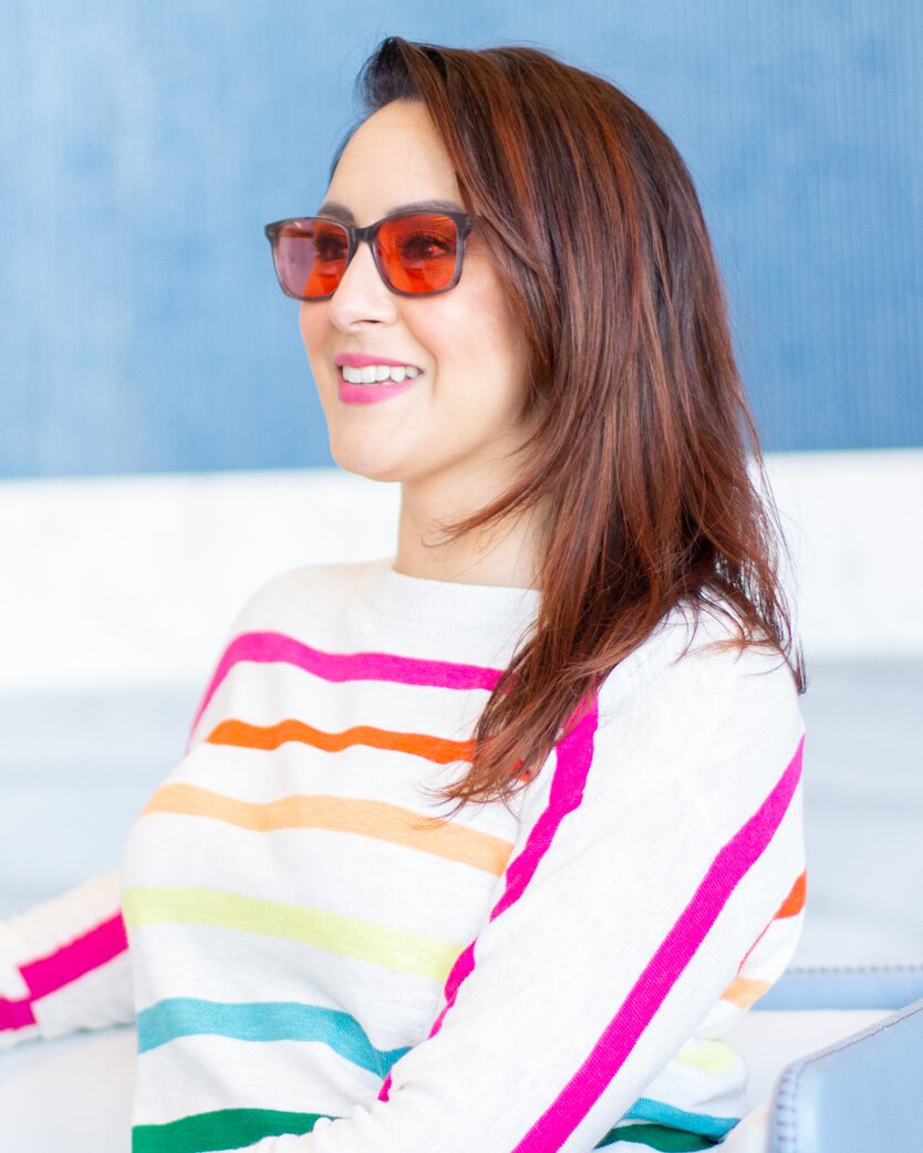Woman wearing indoor TheraSpecs for Glaucoma light sensitivity Woman wearing indoor TheraSpecs for Glaucoma light sensitivity
