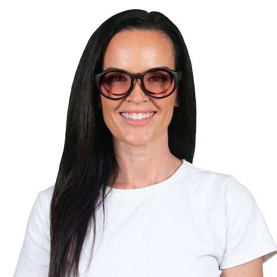Woman wearing TheraSpecs FL-Pro in York WearOver frame style