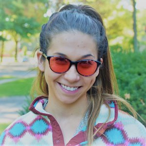 Olivia Wearing Audrey Brown TheraSpecs