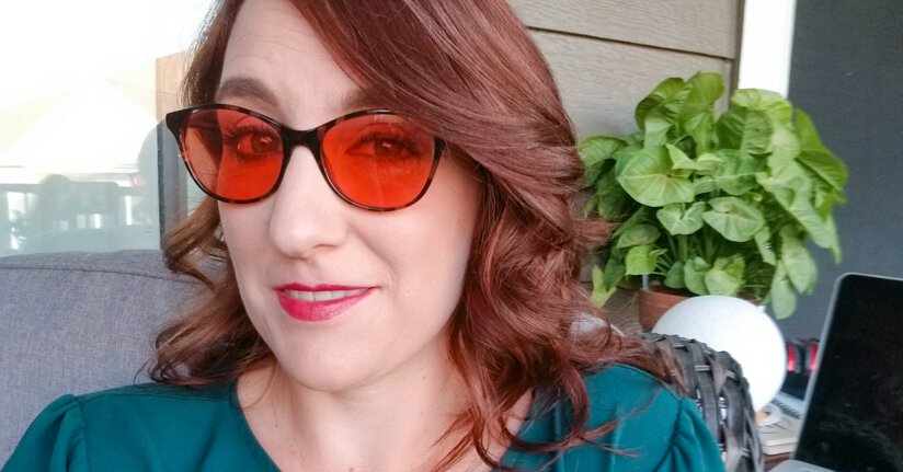 Aimee wearing Audrey indoor TheraSpecs for relief for her attacks