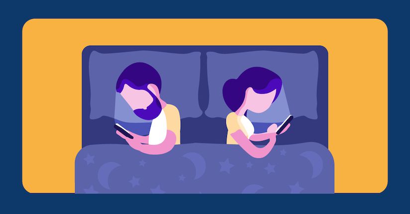 Staring at screen in the dark can cause problems couple staring at phone screens in bed