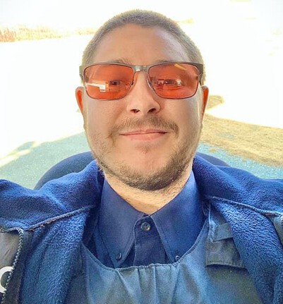 Dean Wearing indoor Conrad TheraSpecs
