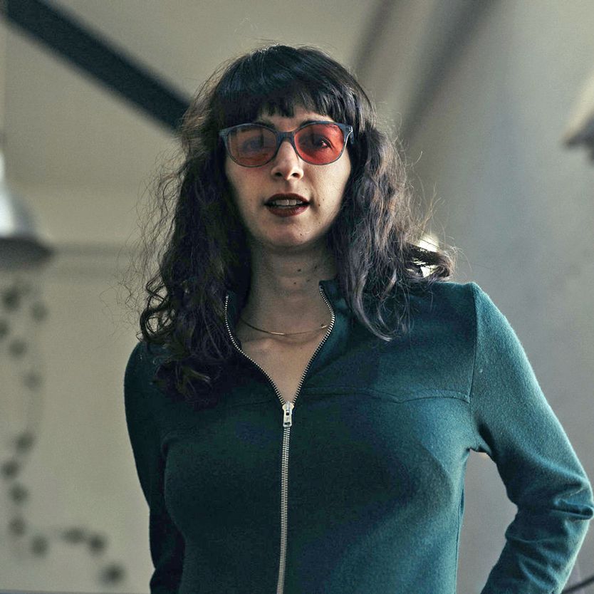Hanna wearing indoor TheraSpecs, Audrey blue frame style