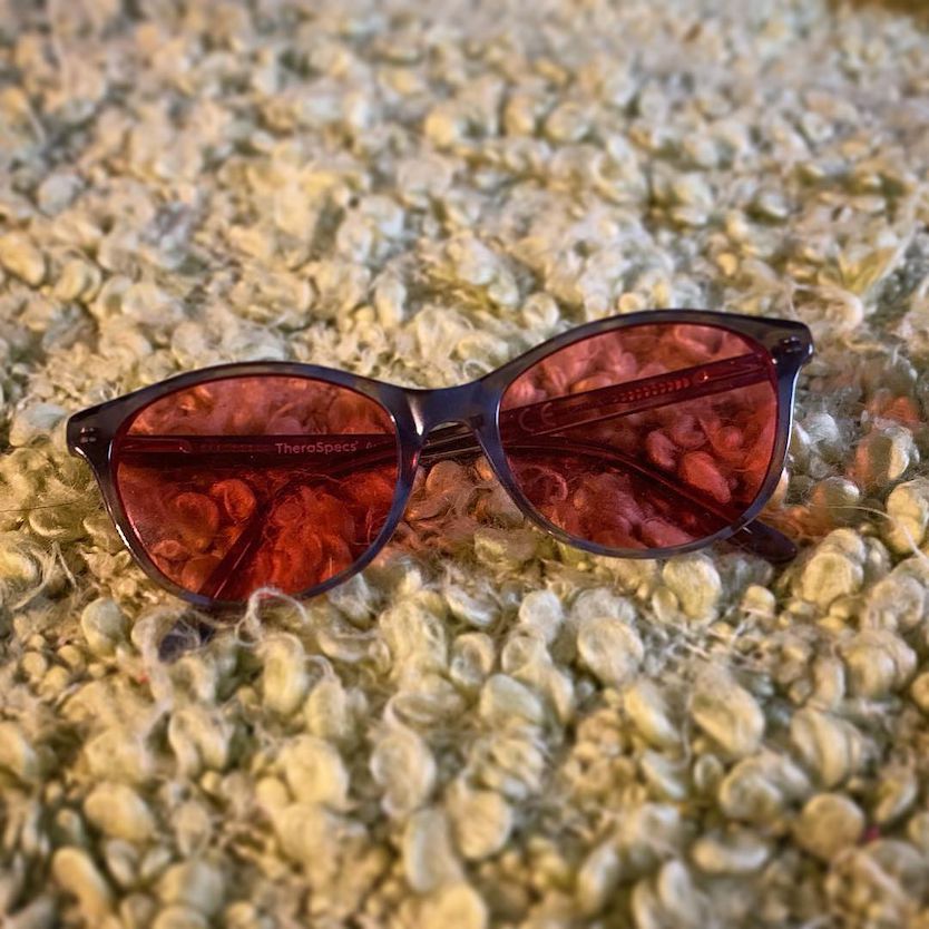 Jacqueline loves her Audrey indoor blue TheraSpecs Audrey Indoor Blue TheraSpecs laying on ground