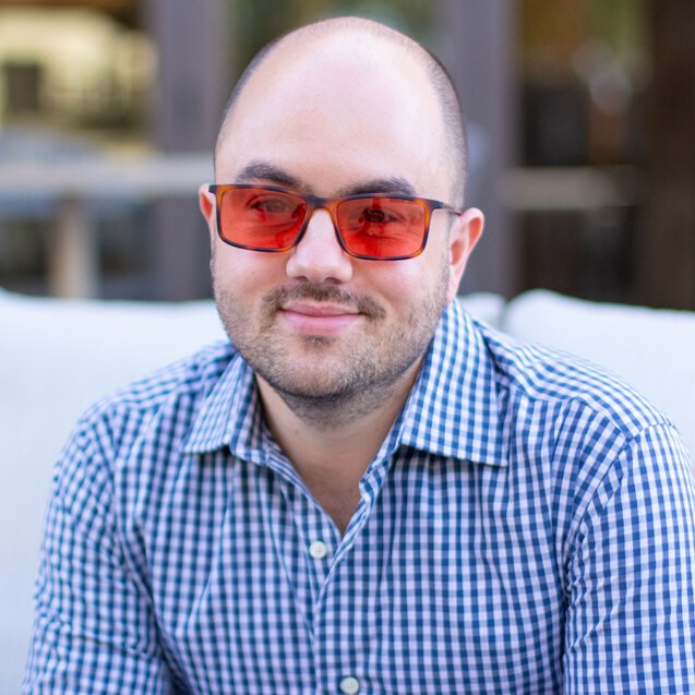 Joe Coe, migraine advocate, wearing indoor