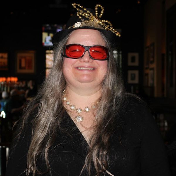 Julie wearing indoor TheraSpecs at a party Julie wearing indoor TheraSpecs at a party