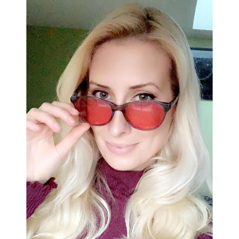 Juliette found relief from eye pain and light sensitivity with TheraSpecs Juliette wearing Audrey indoor TheraSpecs