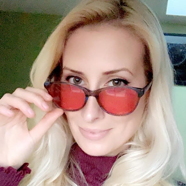 Juliette wearing Audrey indoor TheraSpecs for photophobia Juliette wearing Audrey indoor TheraSpecs for photophobia