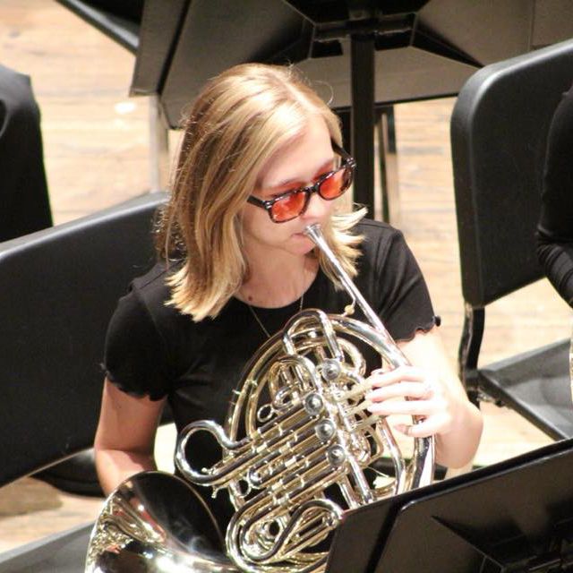 Lorraine's Daughter Playing in the Band Wearing TheraSpecs
