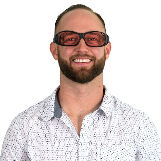 Man wearing WearOver TheraSpecs Indoor