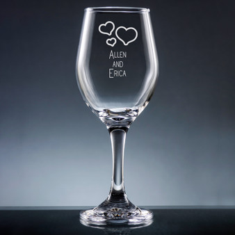 https://cdn11.bigcommerce.com/s-du8ydua/images/stencil/338x338/products/5641/12085/Wedding_Wine_Glass_with_Stem_-_Personalized_Drinkware_-_10_Fonts_EG9438__75210.1561147351.jpg?c=2