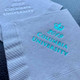 Your Logo Napkins Example: Teal Foil-Pressed on Gray Napkins Your Logo Napkins Example: Teal Foil-Pressed on Gray Napkins