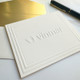 Your Logo Embossed 4x5 Fold Notes with Embassy Border Close Up - Ivory Paper and Gold Envelope Liners - StationeryXpress.com