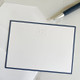 Your Logo Embossed on Flat Cards 4.5 x 6.25 - White Paper - Shown with Optional Navy Border - StationeryXpress - EG5064