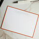 Your Logo Embossed on 4.5 x 6.25 Flat Cards at StationeryXpress.com - White Card with Orange Border & Embossed Logo